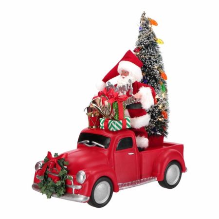 Santa in decorated truck