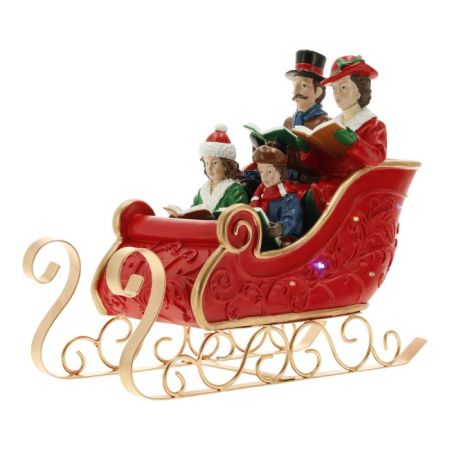 Carol singers in sleigh poly